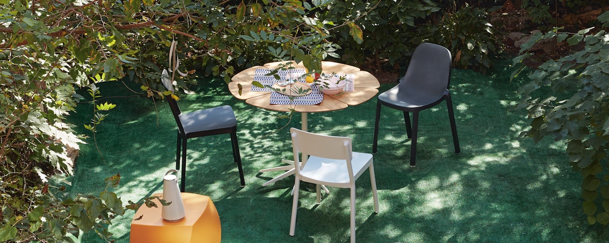 Petal Dining Table in an outdoor patio setting