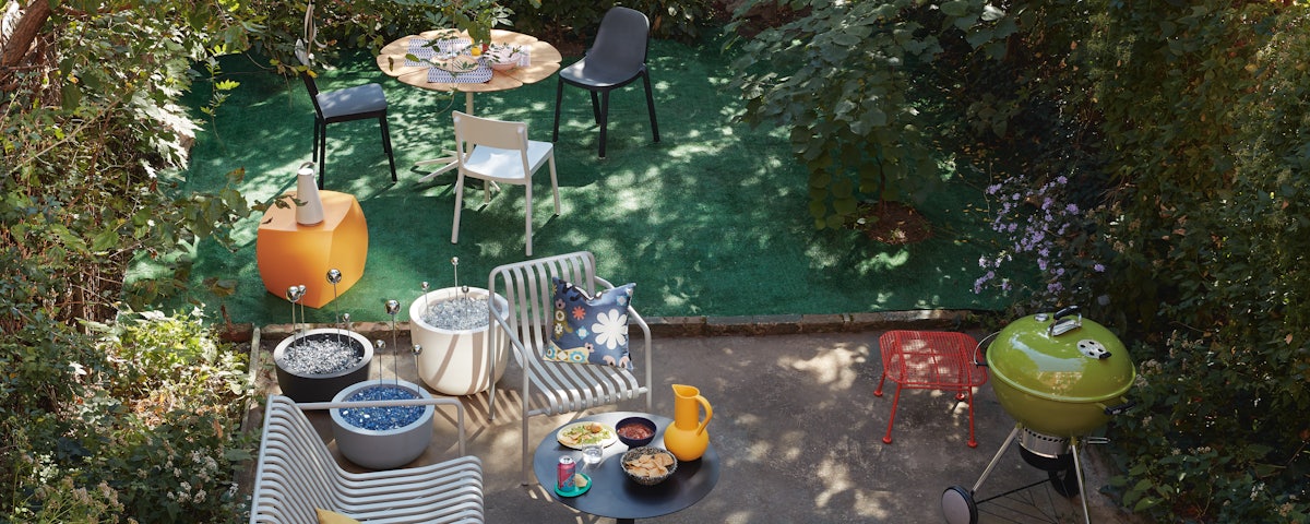 Frank Gehry Left Twist Cube in an outdoor patio setting