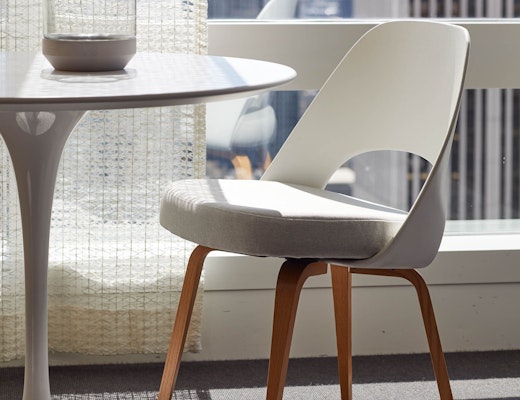 Saarinen Executive Plastic Back with Wood Legs Saarinen Executive Chair Armless Executive Chair Plastic Back Wood Legs Saarinen Pedestal Dining Table meeting table shared spaces touchdown focus refuge