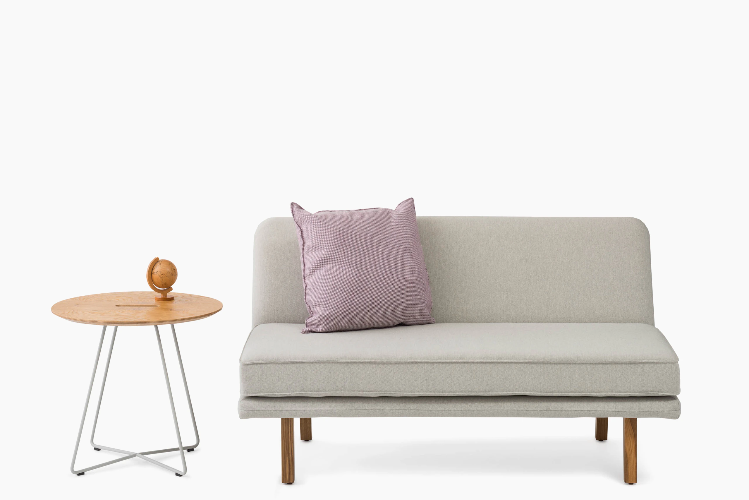 rockwell unscripted armless settee occasional round side table