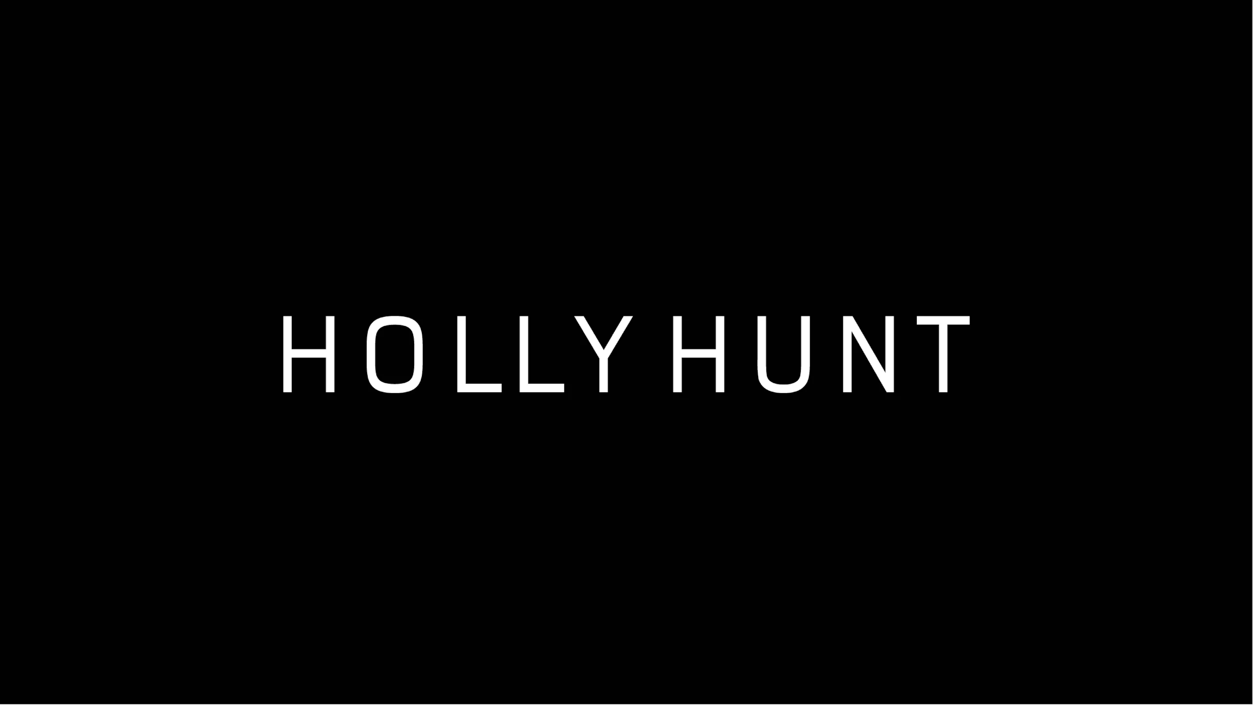 Holly Hunt logo on a black background.