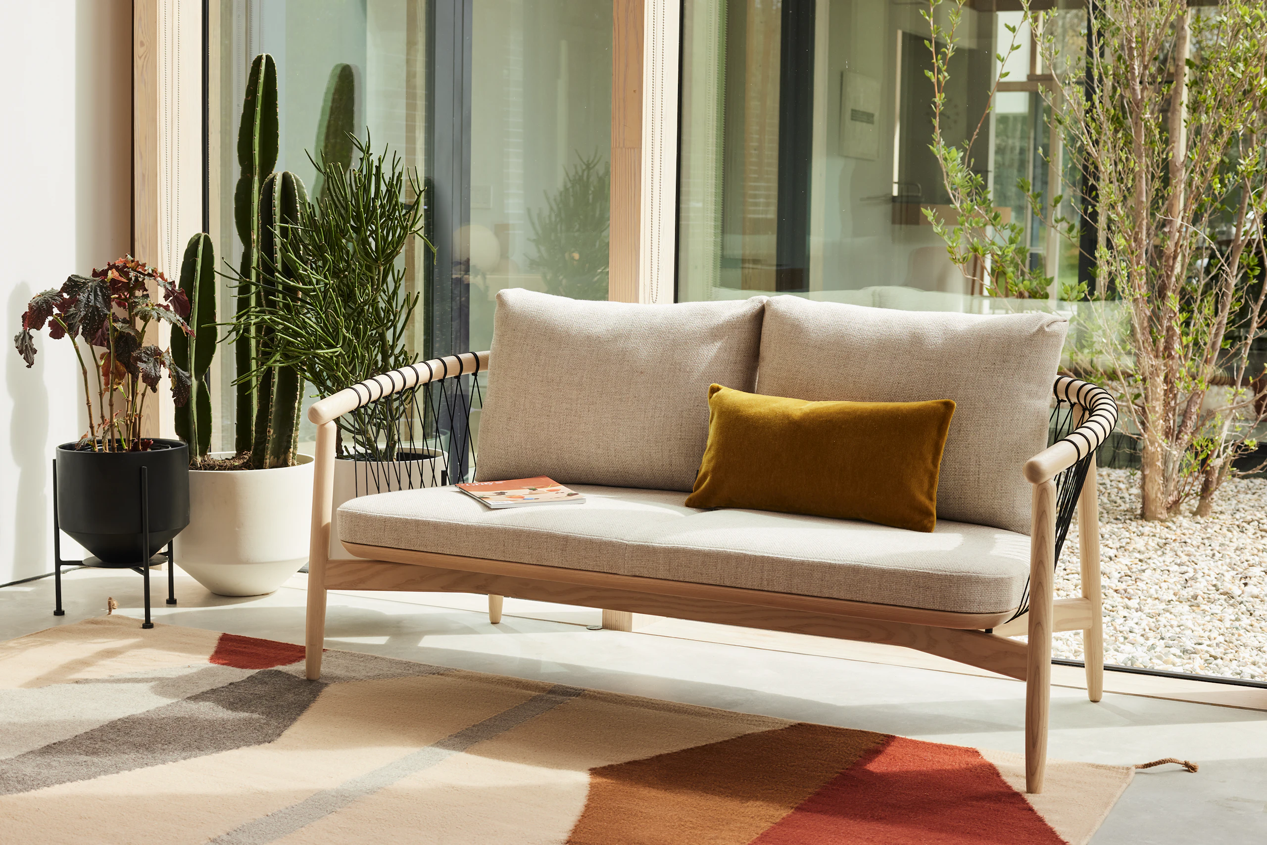 A Crosshatch Settee in a residential setting.