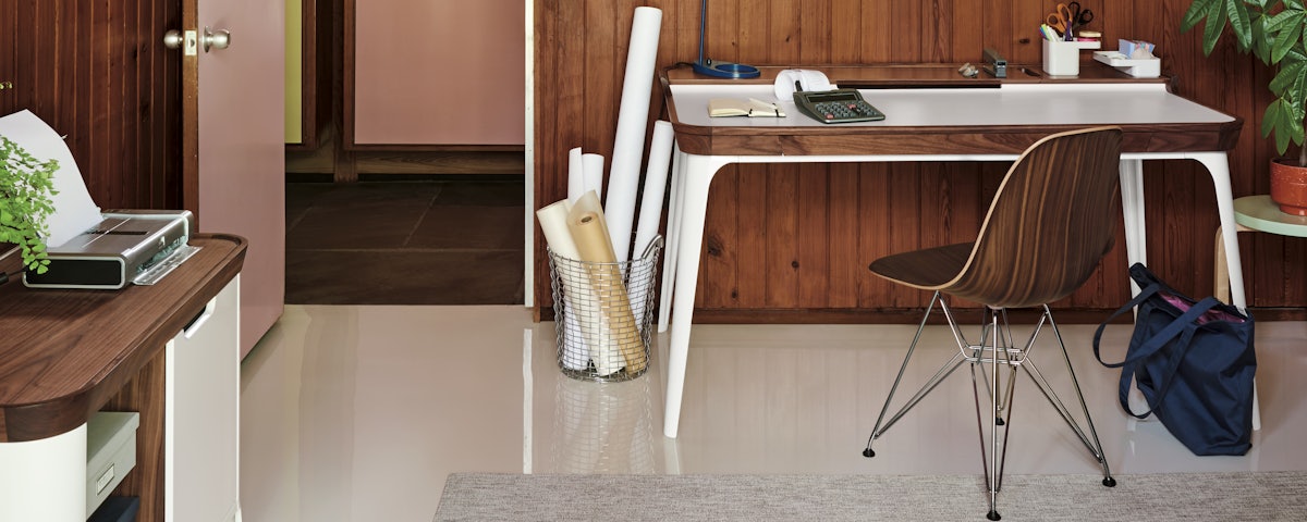 Airia Desk and Eames Molded Plywood Side Chair in a home office setting