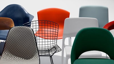 A collection of colorful chairs from the MillerKnoll collective including Eames Shell Chairs and a Saarinen Executive Chair. 
