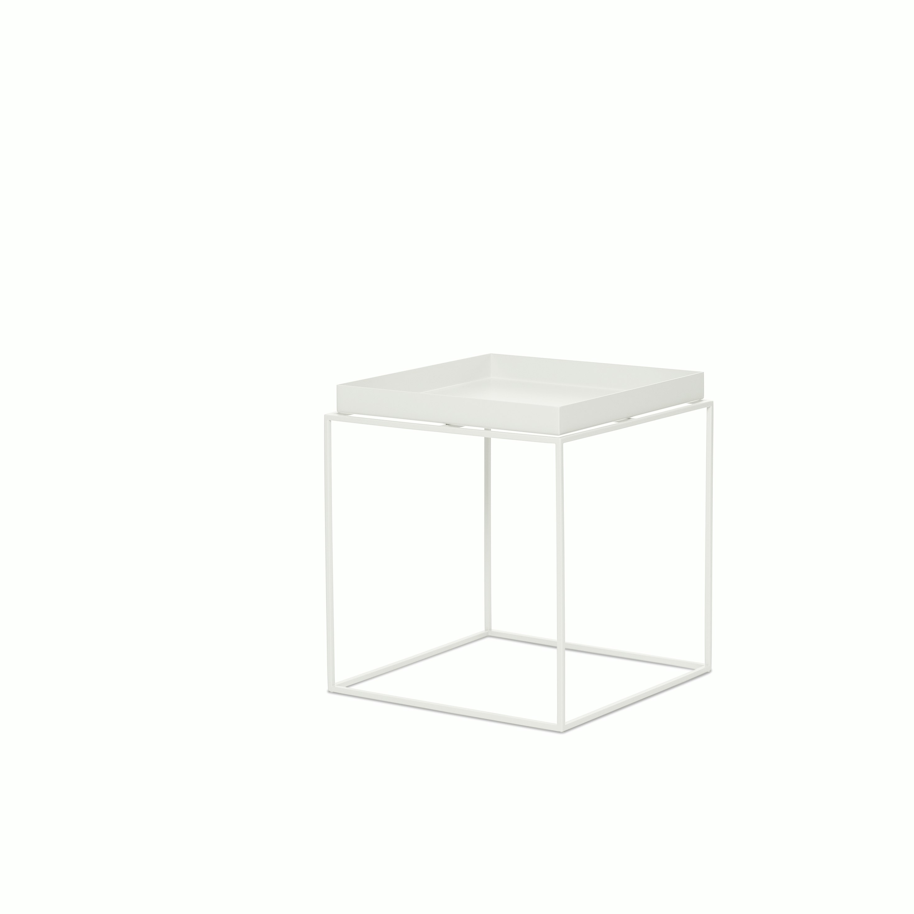 A white Tray Side Table viewed from an angle