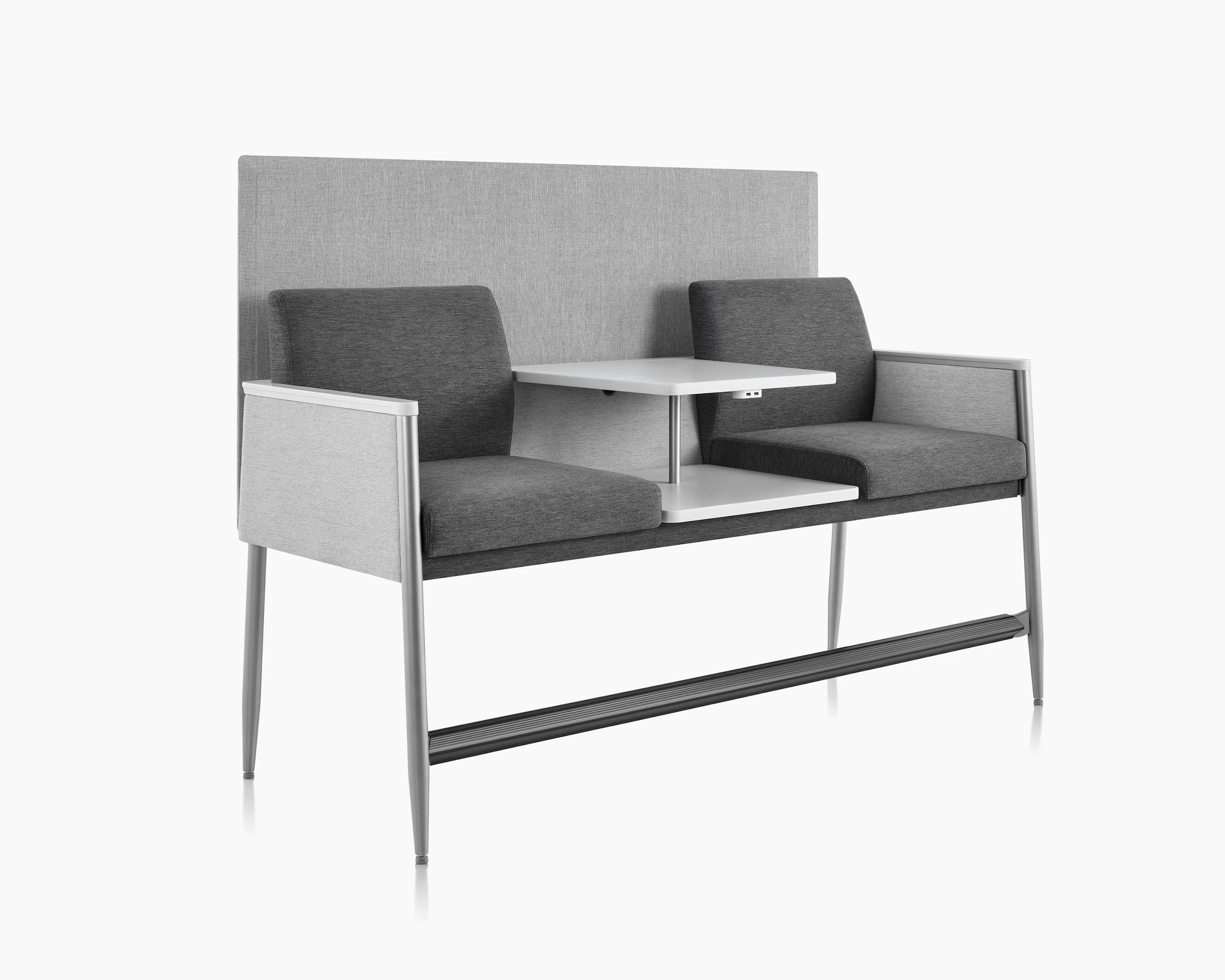 Three-quarter view of Nemschoff Palisade Easy Access Multiple Seating with privacy screen, with solid surface center table and power module.