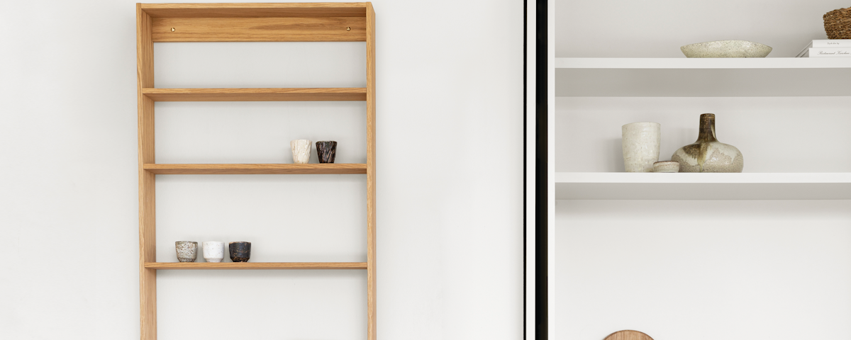 Fivesquare Shelving Bookcase on a wall in a dining room setting