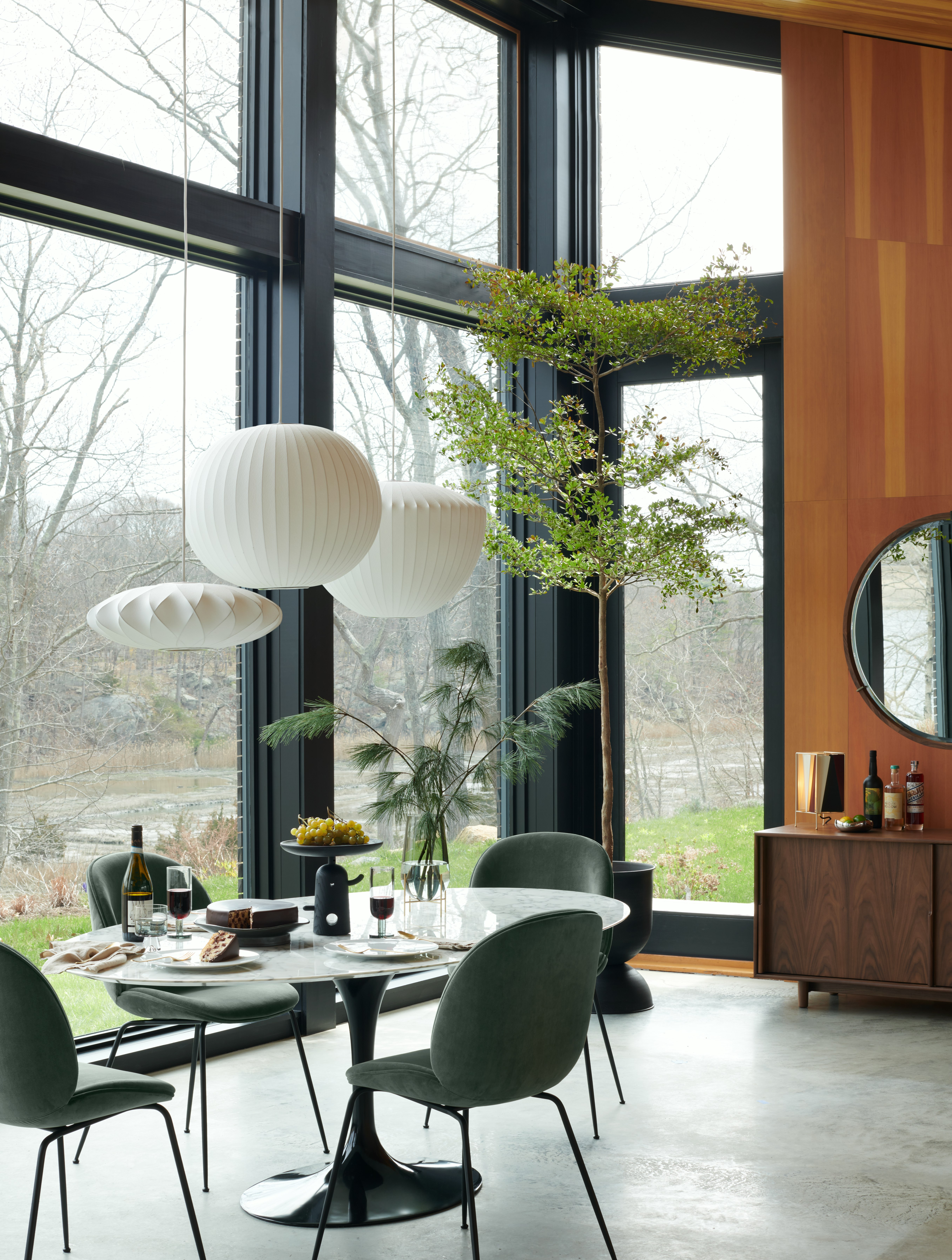 Saarinen Dining Table,  Beetle Side Chair,  Simple Linen Napkins - Set of 4,  Almoco Flatware,  TAC 02 Dinnerware Set,  Reaction Poetique Centerpiece,  Nelson Apple Bubble Pendant,  Nelson Ball Bubble Pendant,  Nelson Saucer Crisscross Bubble Pendant,  Nelson Saucer Crisscross Bubble Pendant,  Echasse Vase,  B-4 Table Light