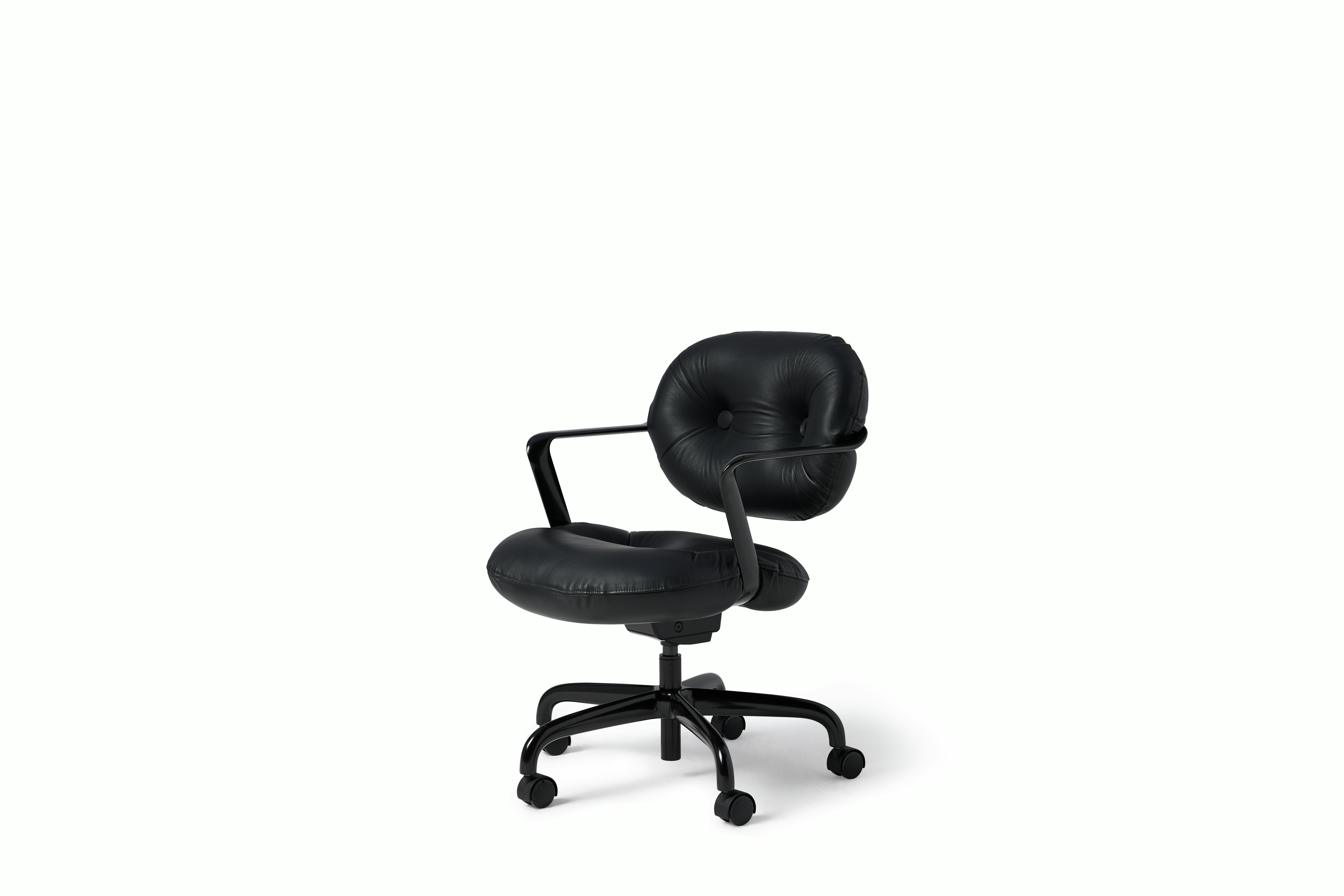 Front angle view of a Morrison Hannah chair with a black frame and base with fixed arms and black leather upholstery.