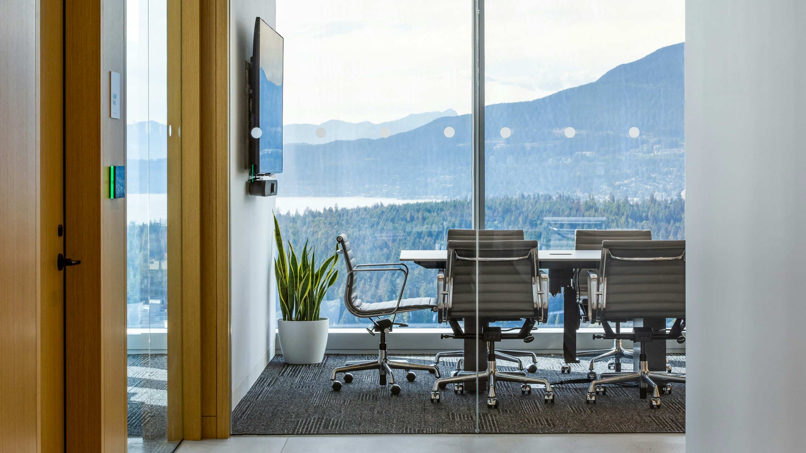 A meeting room at Blakes law firm furnished with Eames aluminum group chairs by Herman Miller