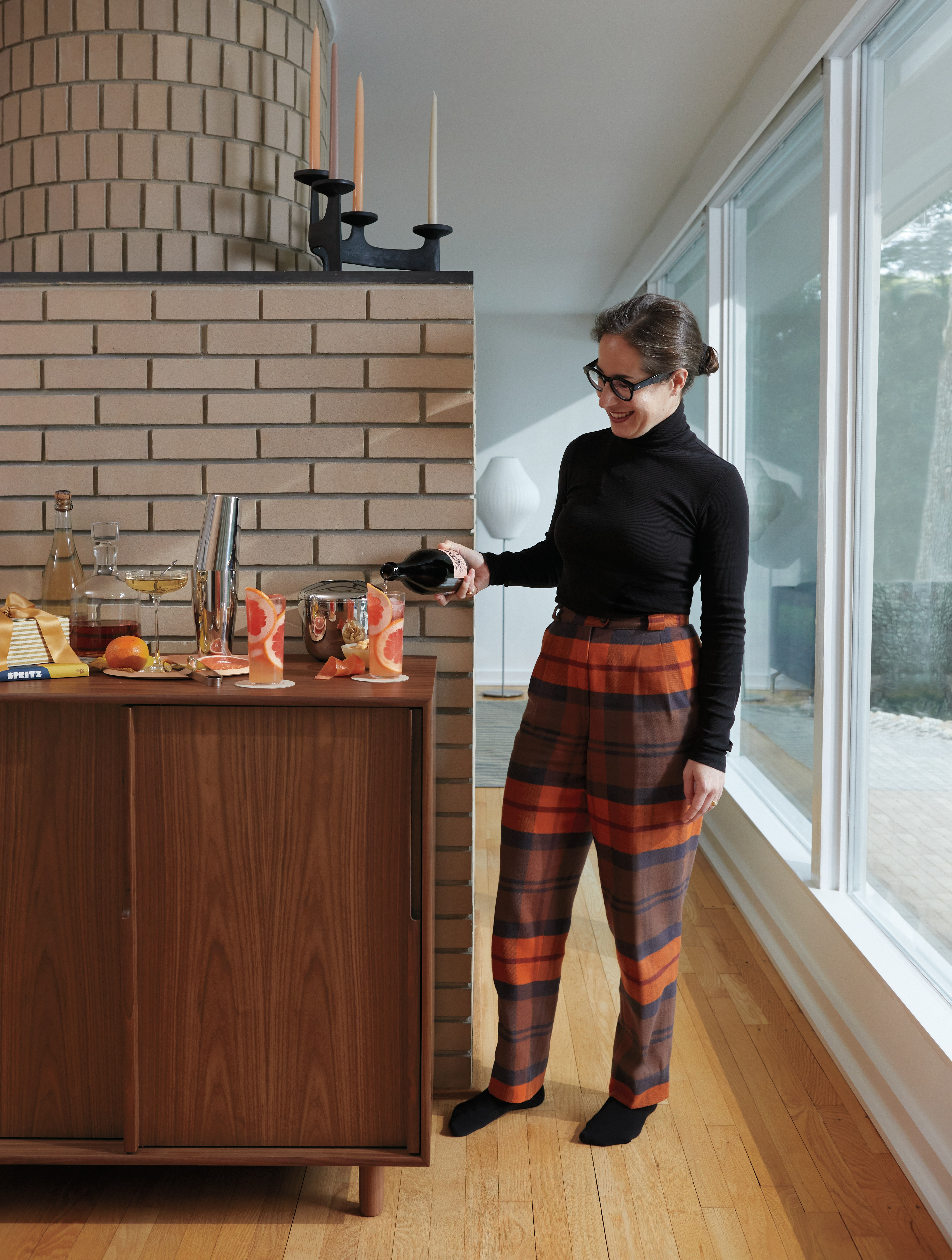 Talia making cocktails