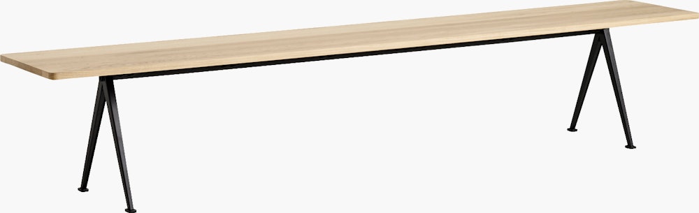 A front angle view of the Pyramid Bench with overhang in matte lacquered oak.