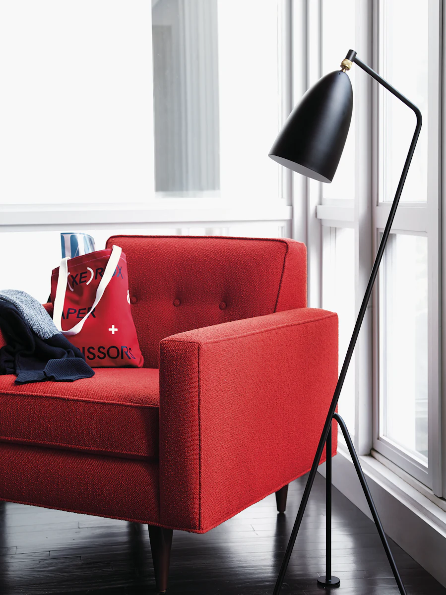 Red Bantam armchair with floor lamp