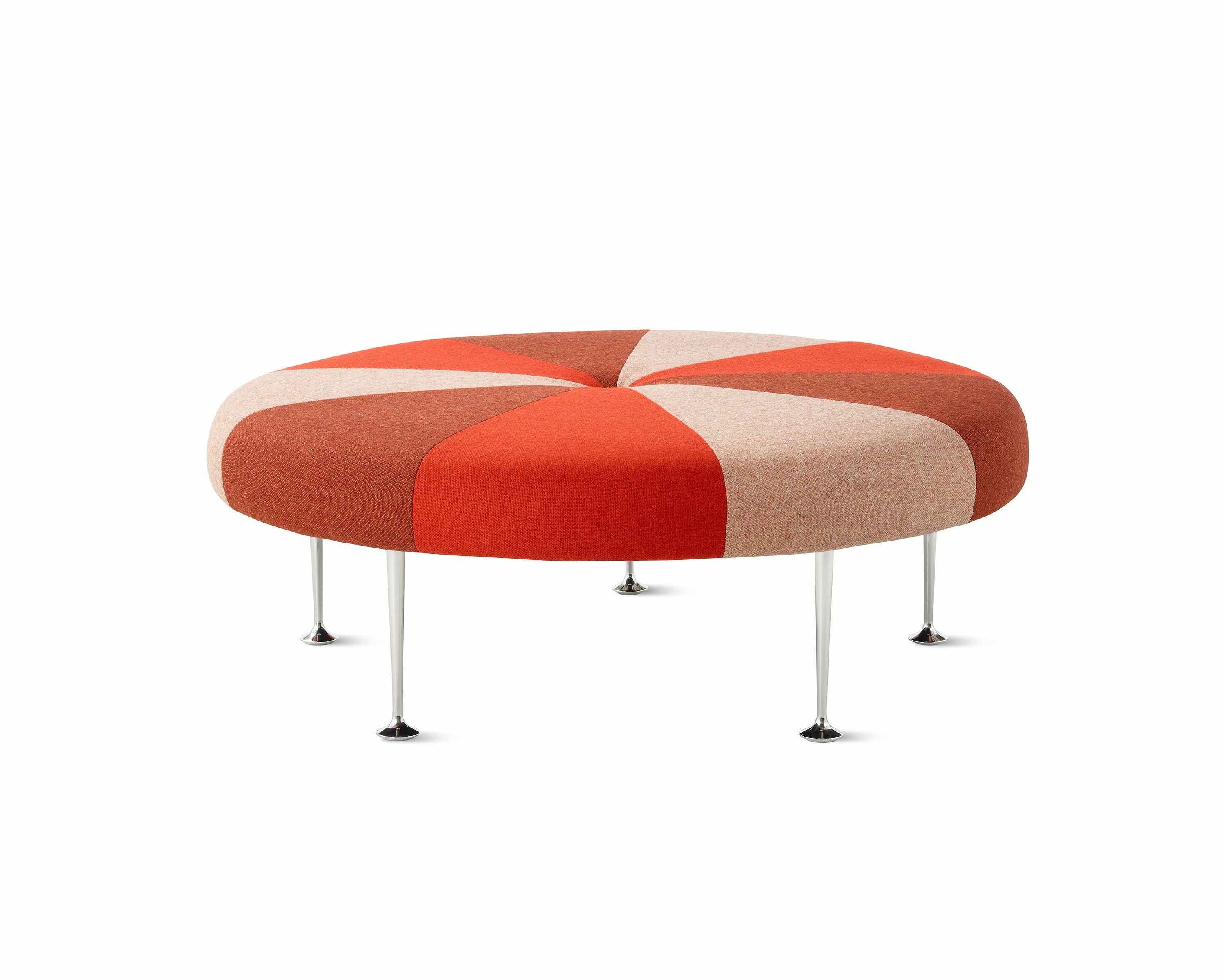 A Girard Color Wheel Ottoman upholstered in red fabrics, viewed from the side.