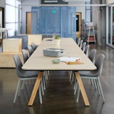 Rockwell Unscripted Community Space with Muuto rockwell unscripted library table tall table drink rail upholstered seat swivel stool creative wall filzfelt hanging panels fixed fins glass work lounge assembly community immersive open room semi enclosure muuto fiber side chair hospitality team meeting