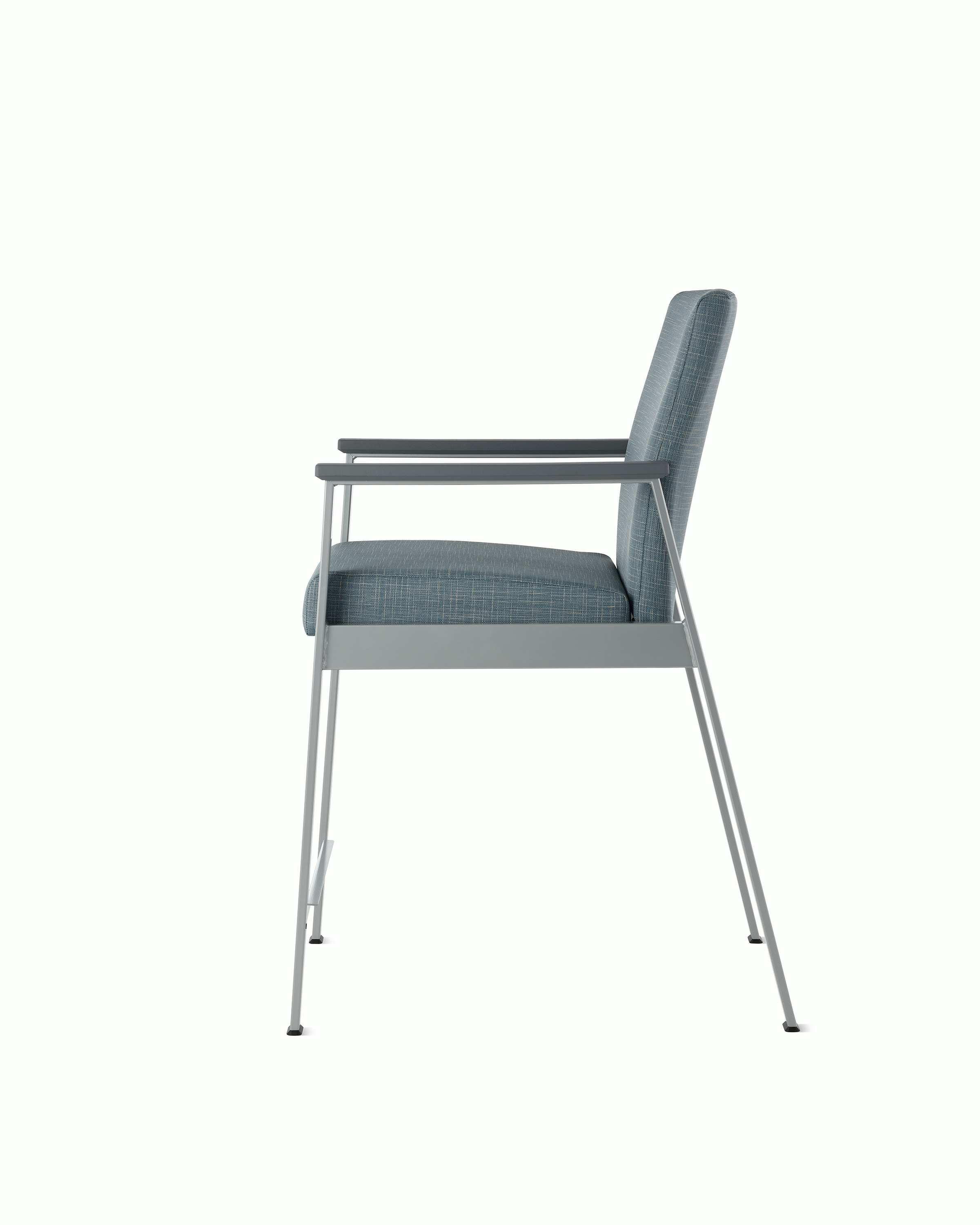 Side view of an Easton Easy Access Chair with blue upholstery, metallic silver four leg base and slate grey arm caps.