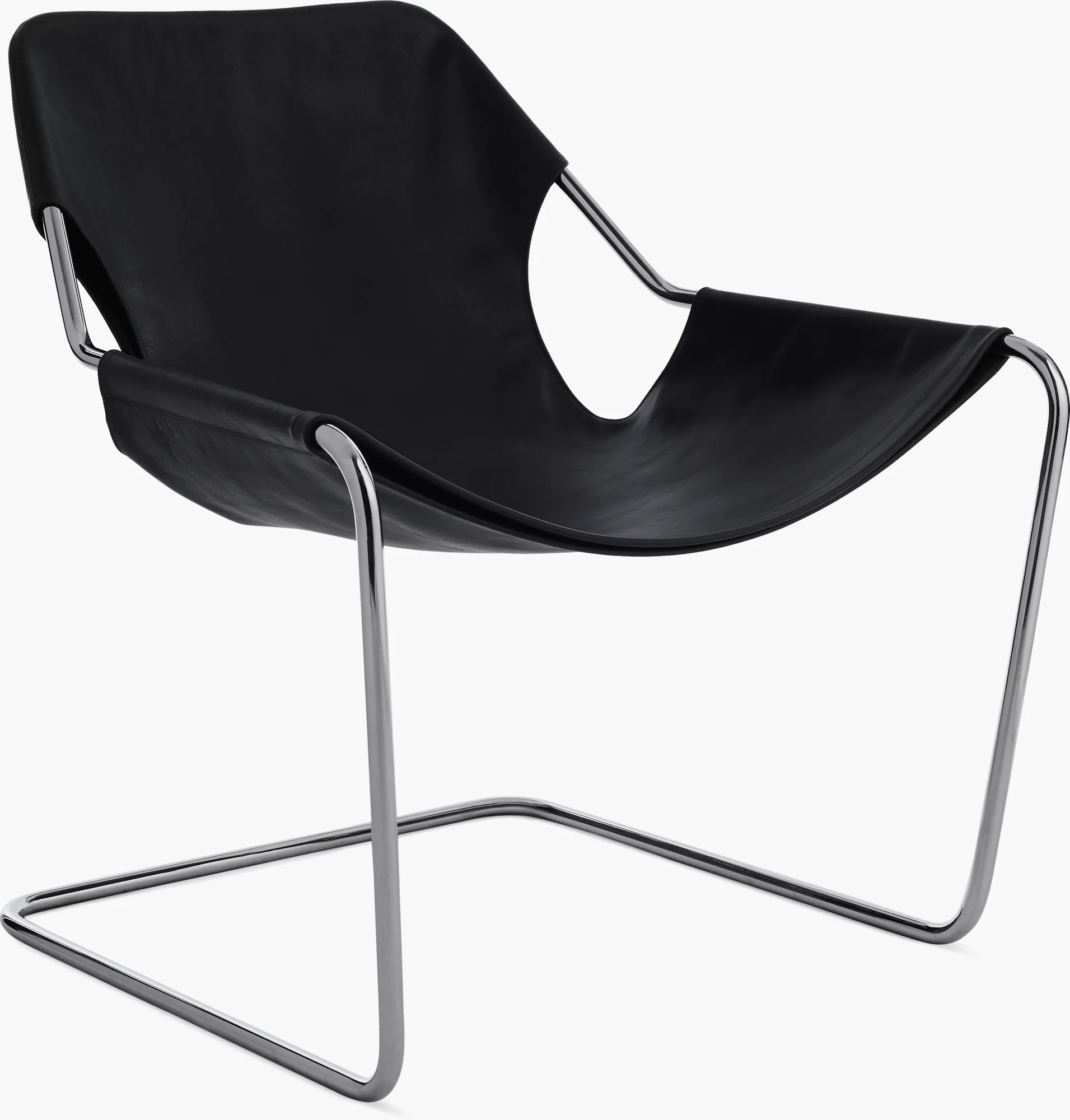 Paulistano armchair angled view showing chrome legs and black shell