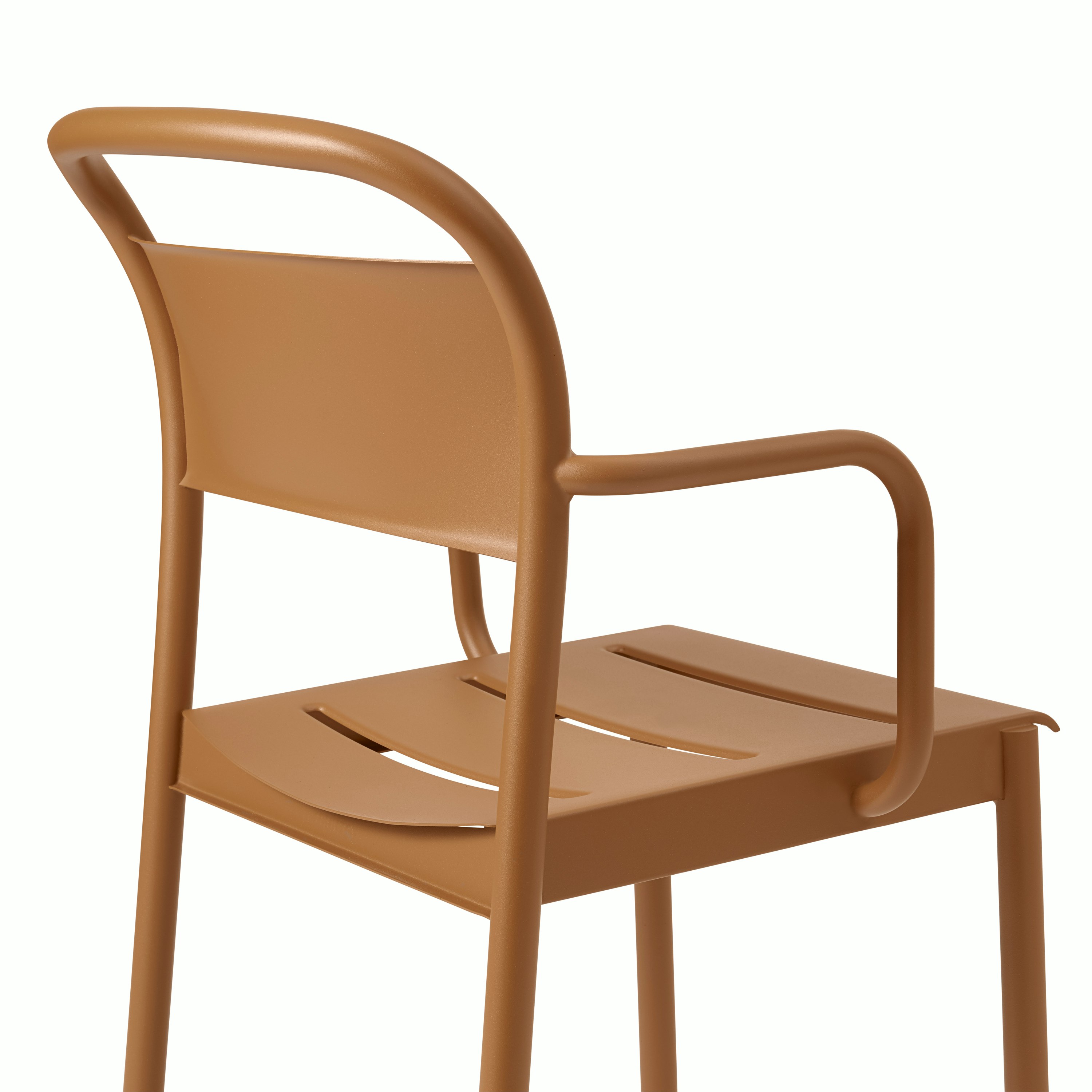 Linear steel armchair burnt orange detail Muuto