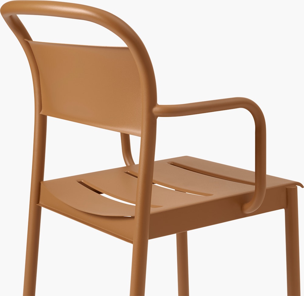 Linear steel armchair burnt orange detail Muuto