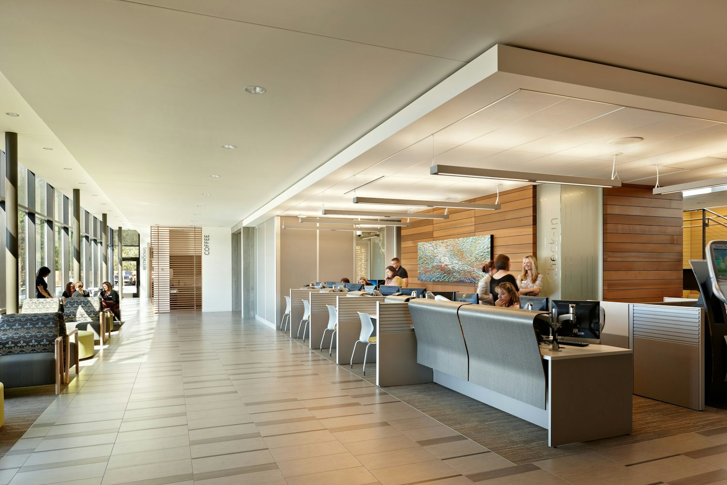 Everett Clinic patient registration reception area Antenna Workspaces Antenna Design Currents Fence MultiGeneration stacking chair stacking base healthcare health care outpatient clinic