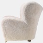 Tired Man Lounge Chair in Dark Stained Oak,  Sheepskin,  Moonlight