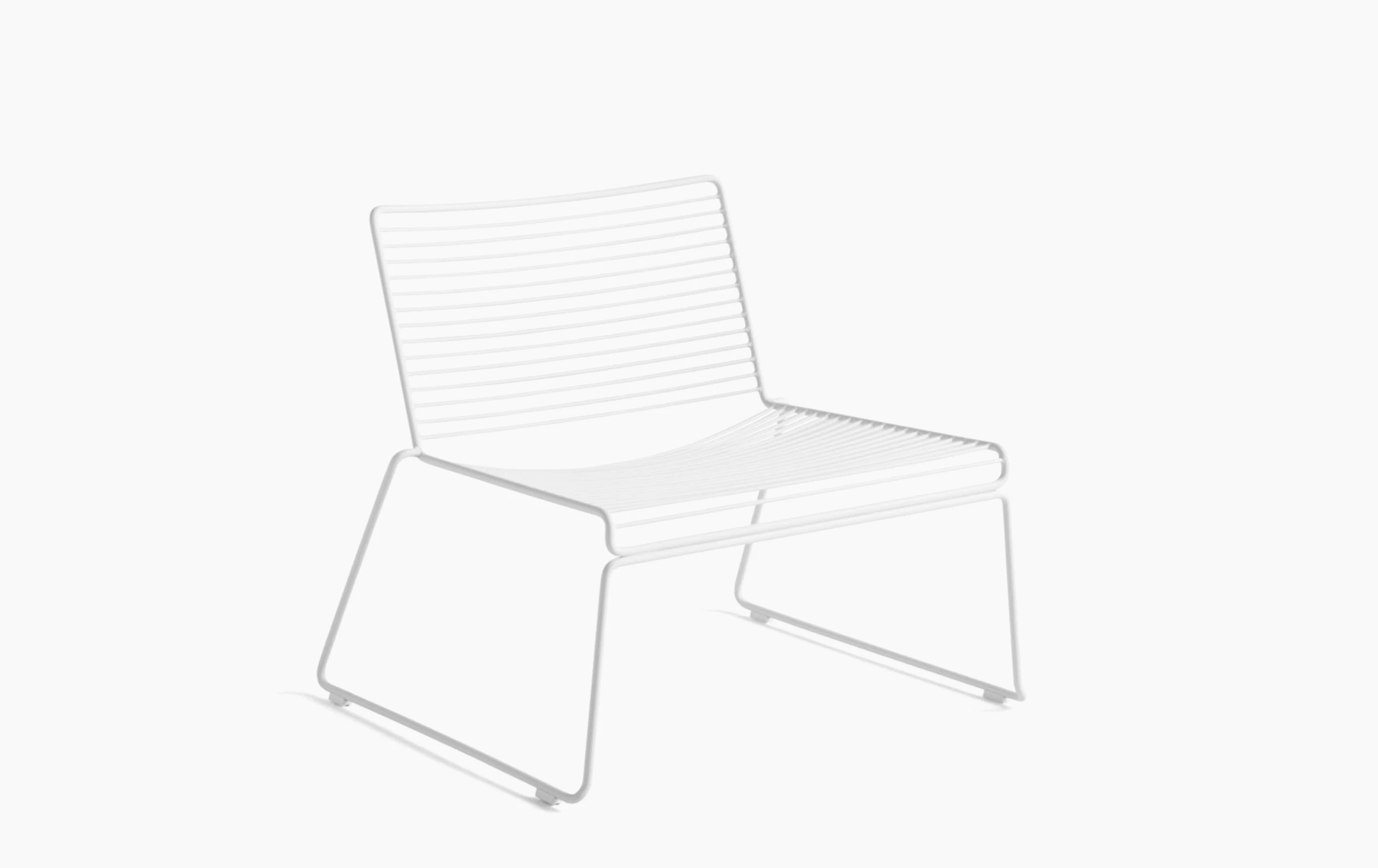 A front angle view of the Hee Lounge Chair in white.