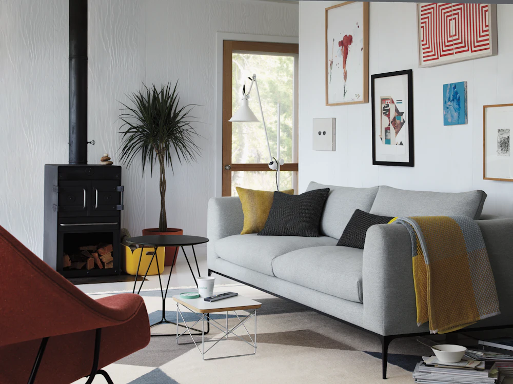 Side view of room with Jonas sofa and fireplace