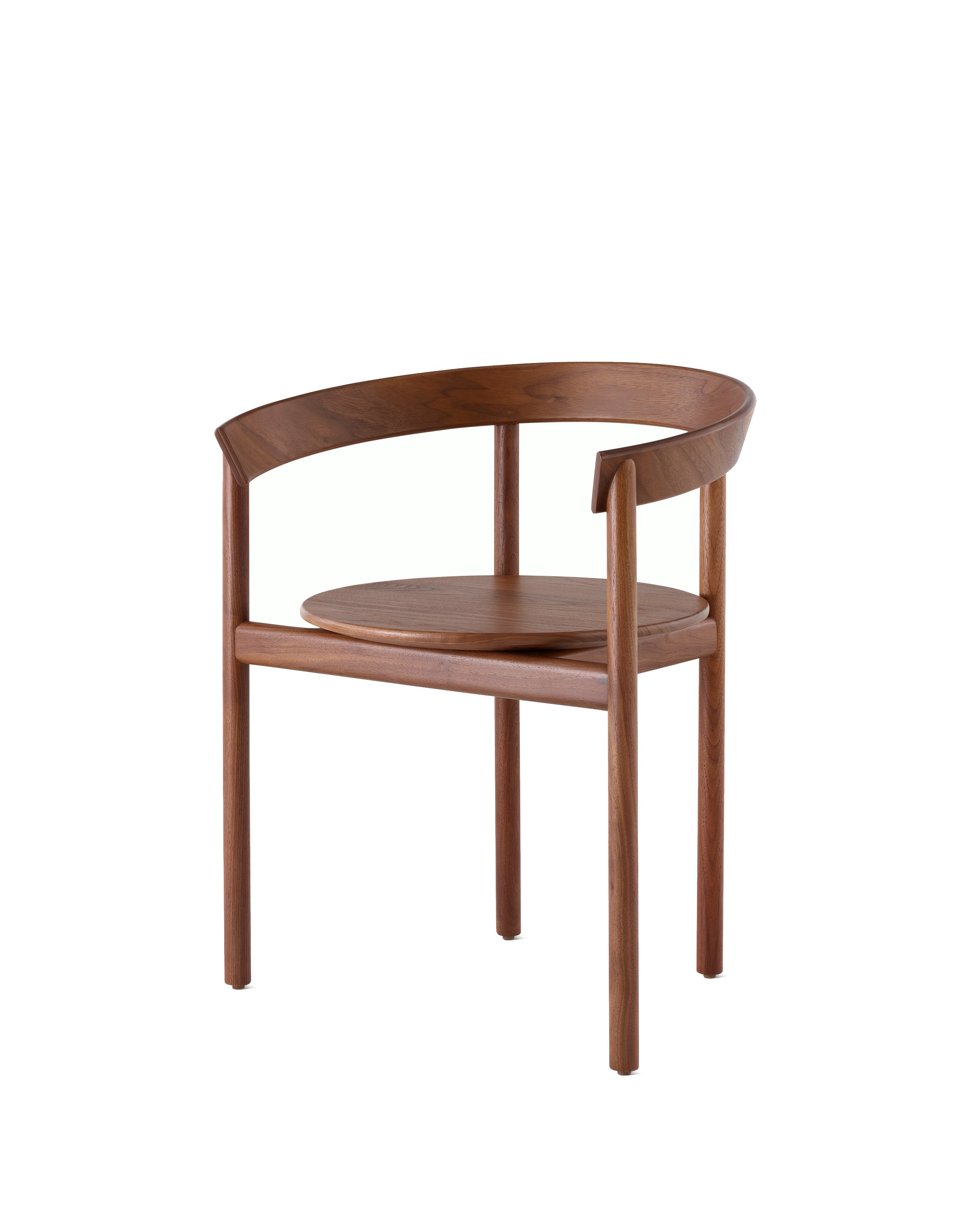 A walnut Comma Chair with arms, viewed from the front at an angle.