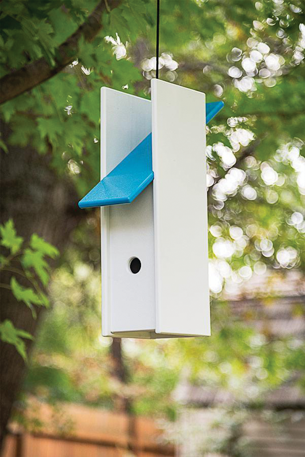 Loll Rapson Birdhouse in an outdoor setting