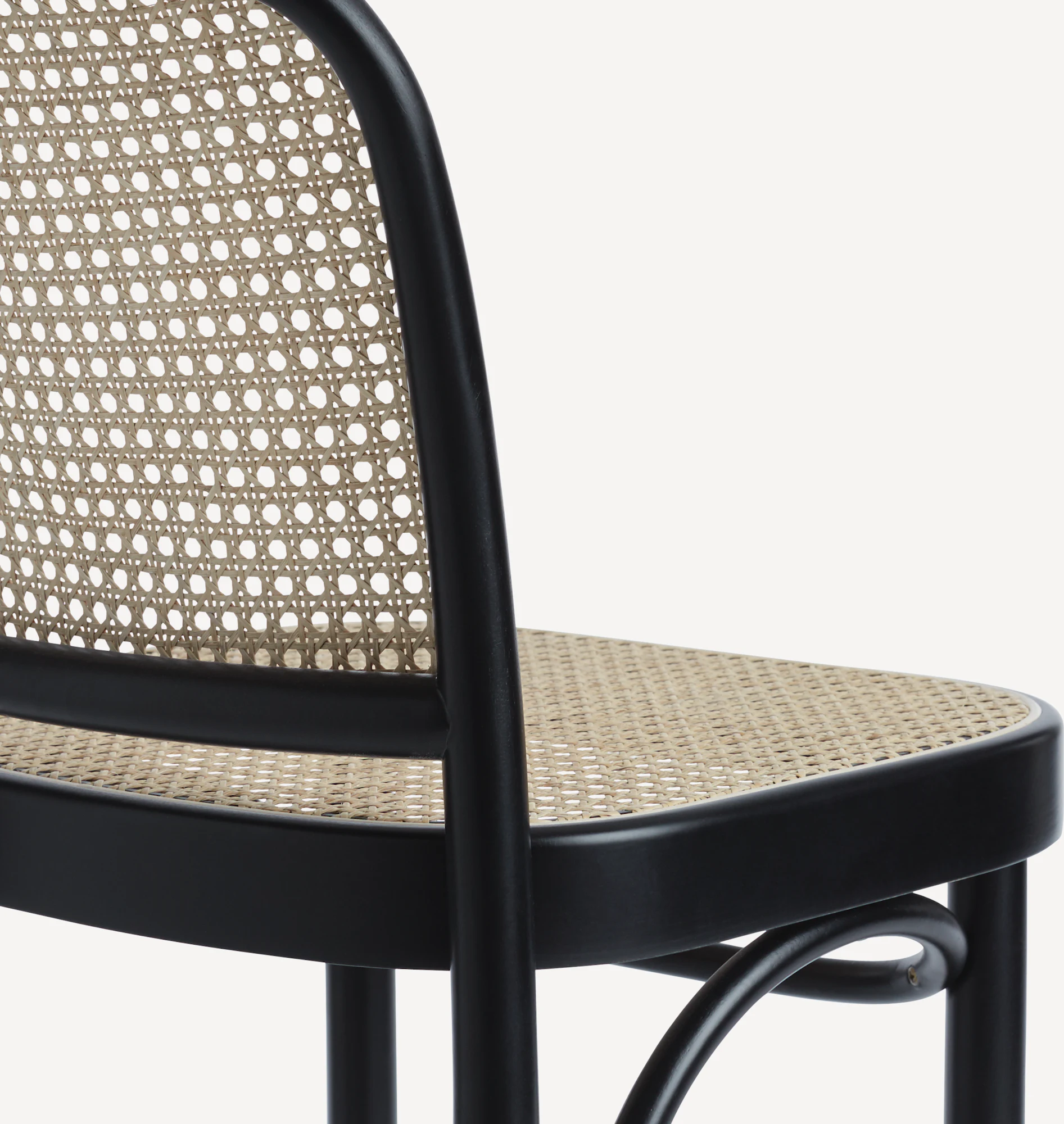 Black Hoffmann stool with light woven seat and backrest