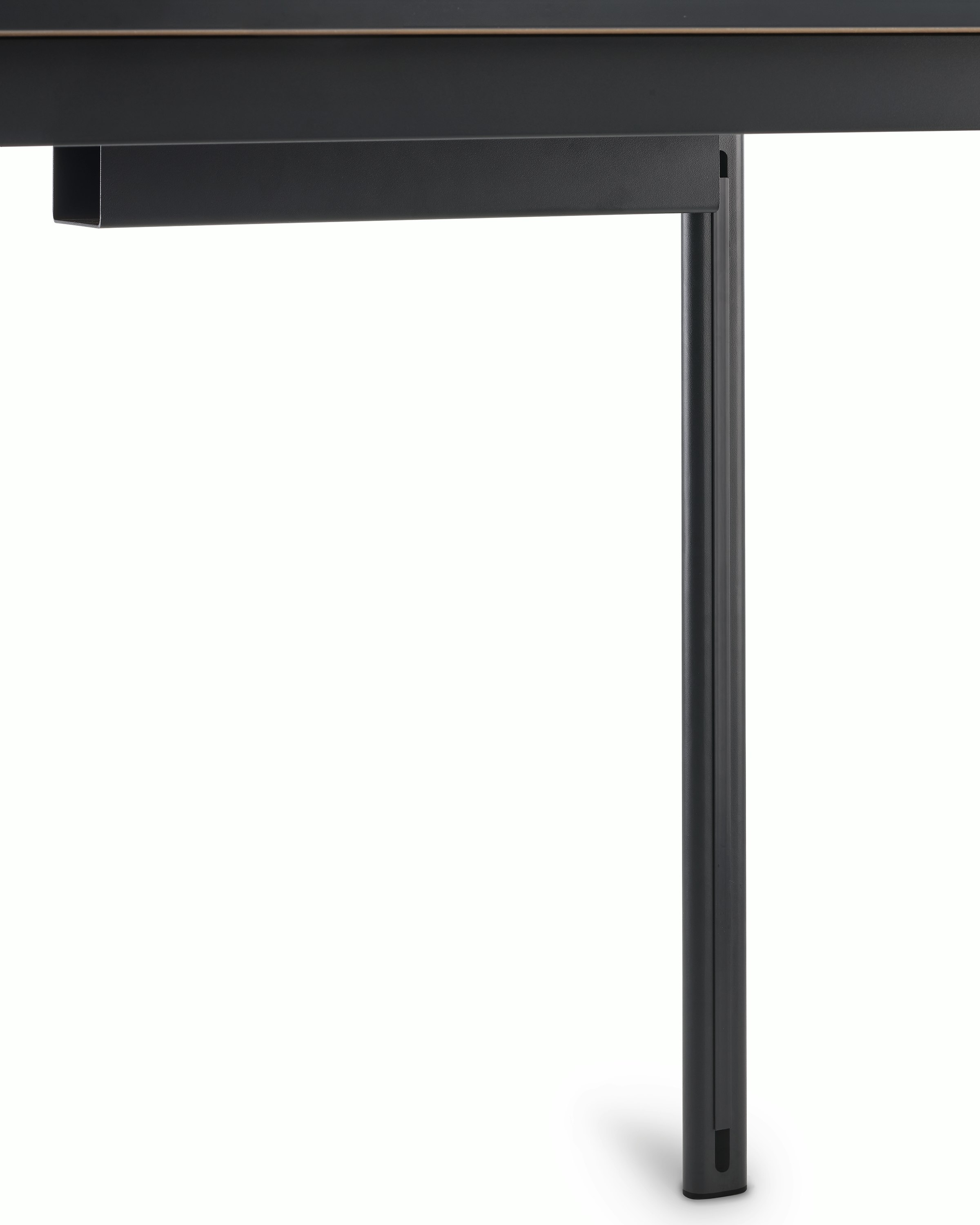 Detail view of steel legs in black on a Mode desk.