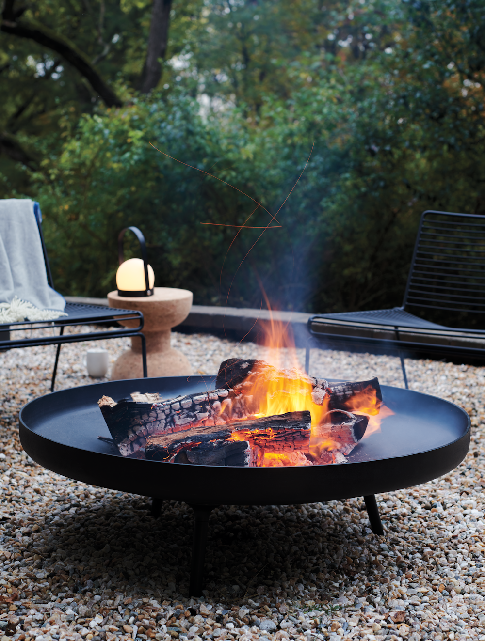 Deco Fire Bowl in an outdoor courtyard setting