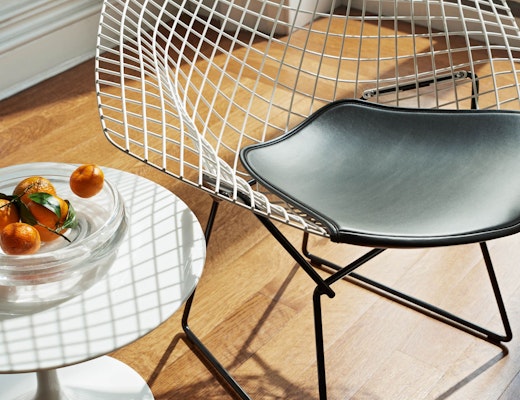 Bertoia Two-Tone Diamond Chair with Saarinen Side Table residential KnollStudio home residence residential living room living area