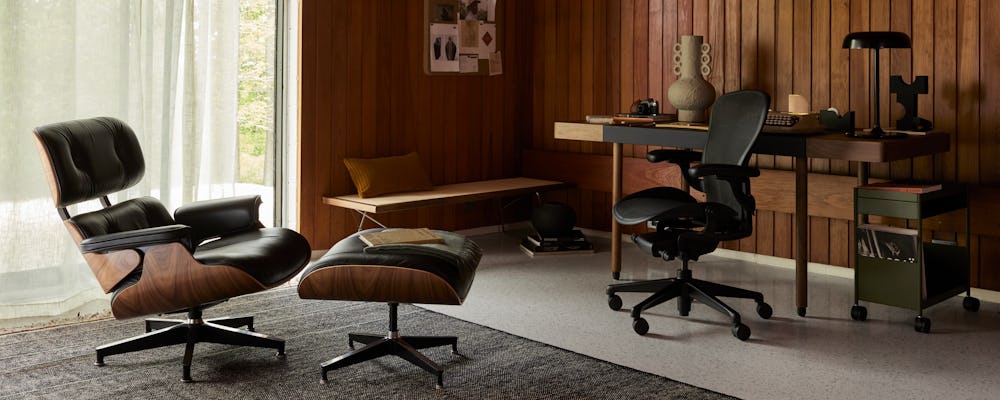 Leatherwrap Sit-to-Stand Desk,  Maharam Argali Rug,  Ode Desk Lamp,  Eames Lounge Chair and Ottoman,  Aeron Chair