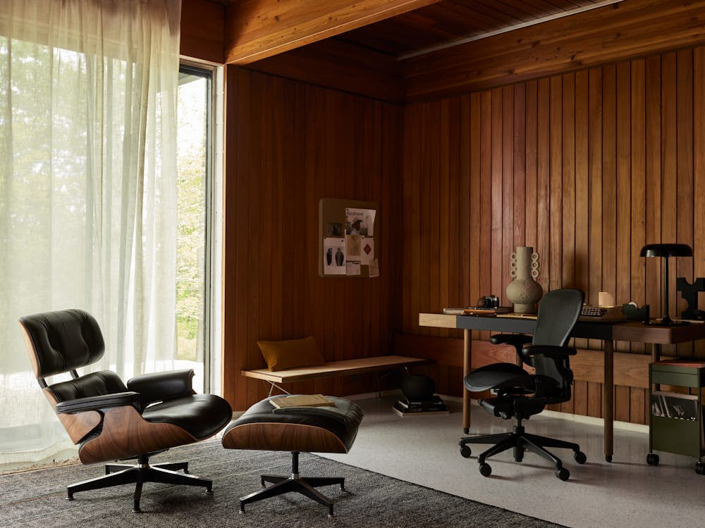 Leatherwrap Sit-to-Stand Desk,  Maharam Argali Rug,  Ode Desk Lamp,  Eames Lounge Chair and Ottoman,  Aeron Chair