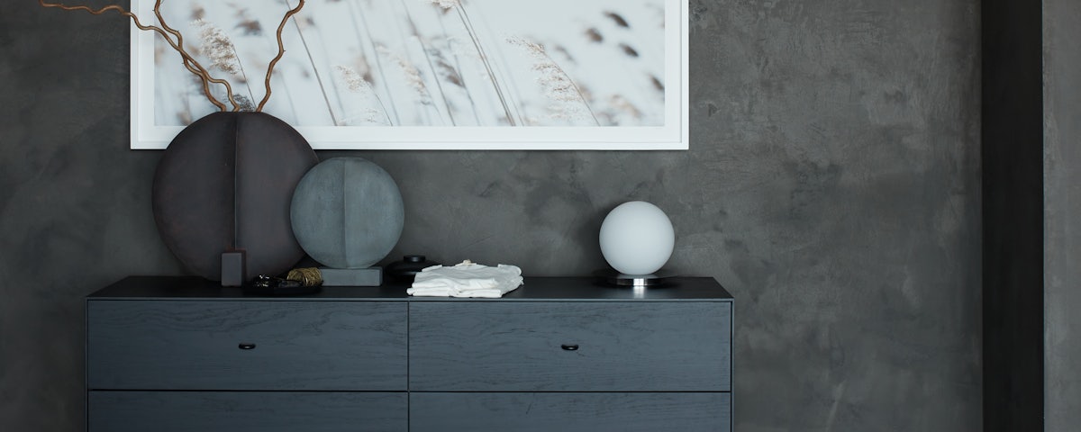 Guggenheim Vases on top of Loop Dresser in home setting
