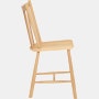An oak J 41 Side Chair viewed from the side