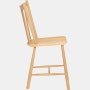 An oak J 41 Side Chair viewed from the side