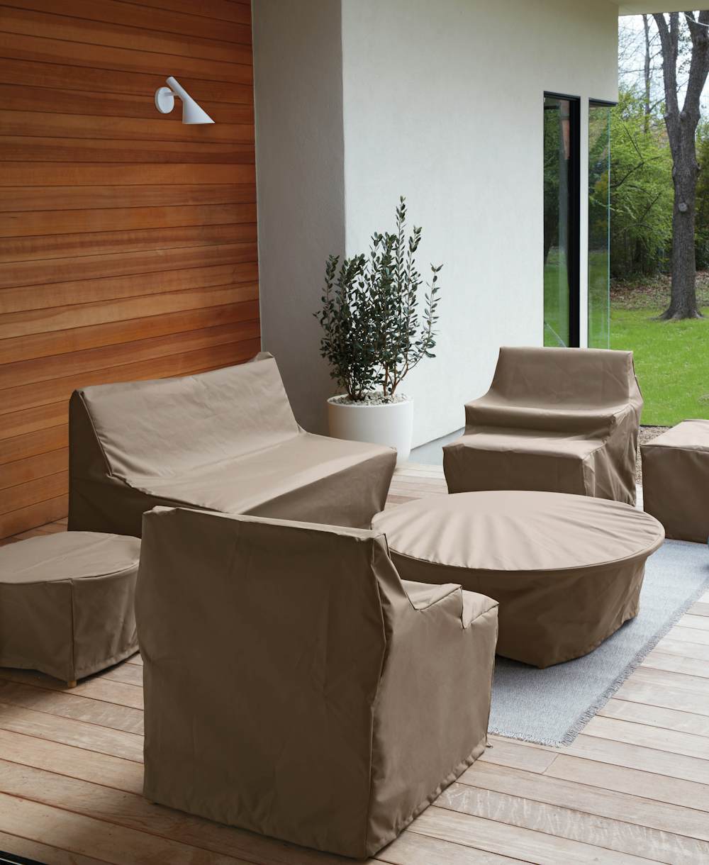 Eos Outdoor Furniture under Eos Table Covers in an outdoor patio setting