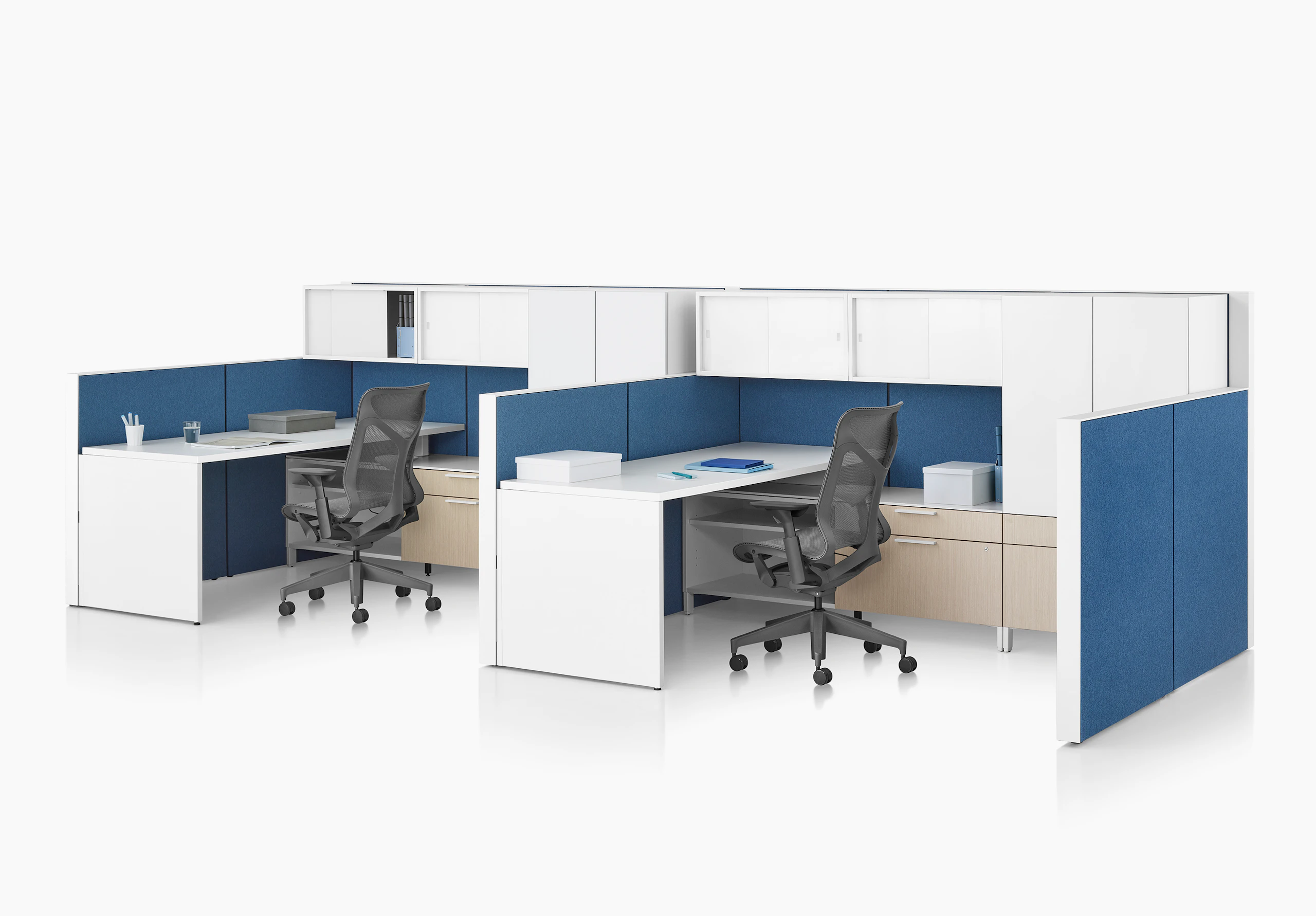 Canvas Wall workstation with blue panels and white overhead storage.