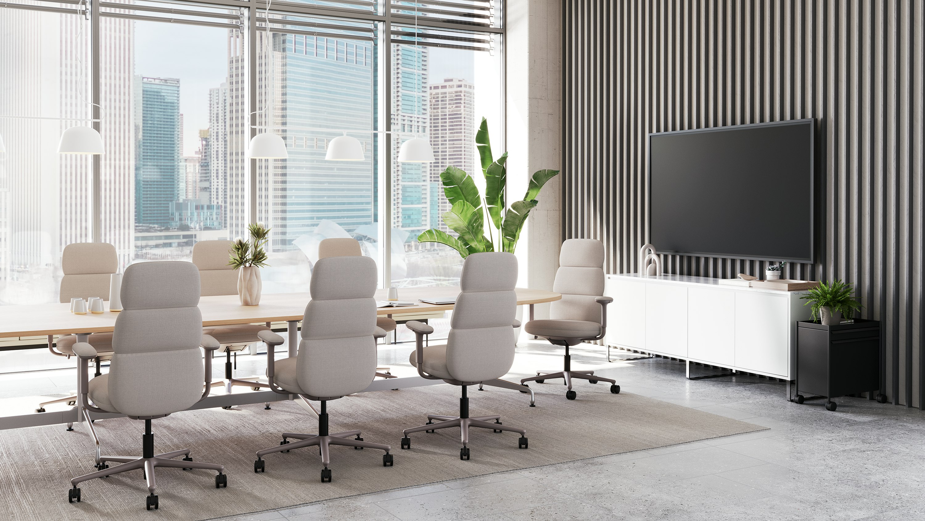 Seven high-back Asari chairs in light brown surround a table in a conference room.