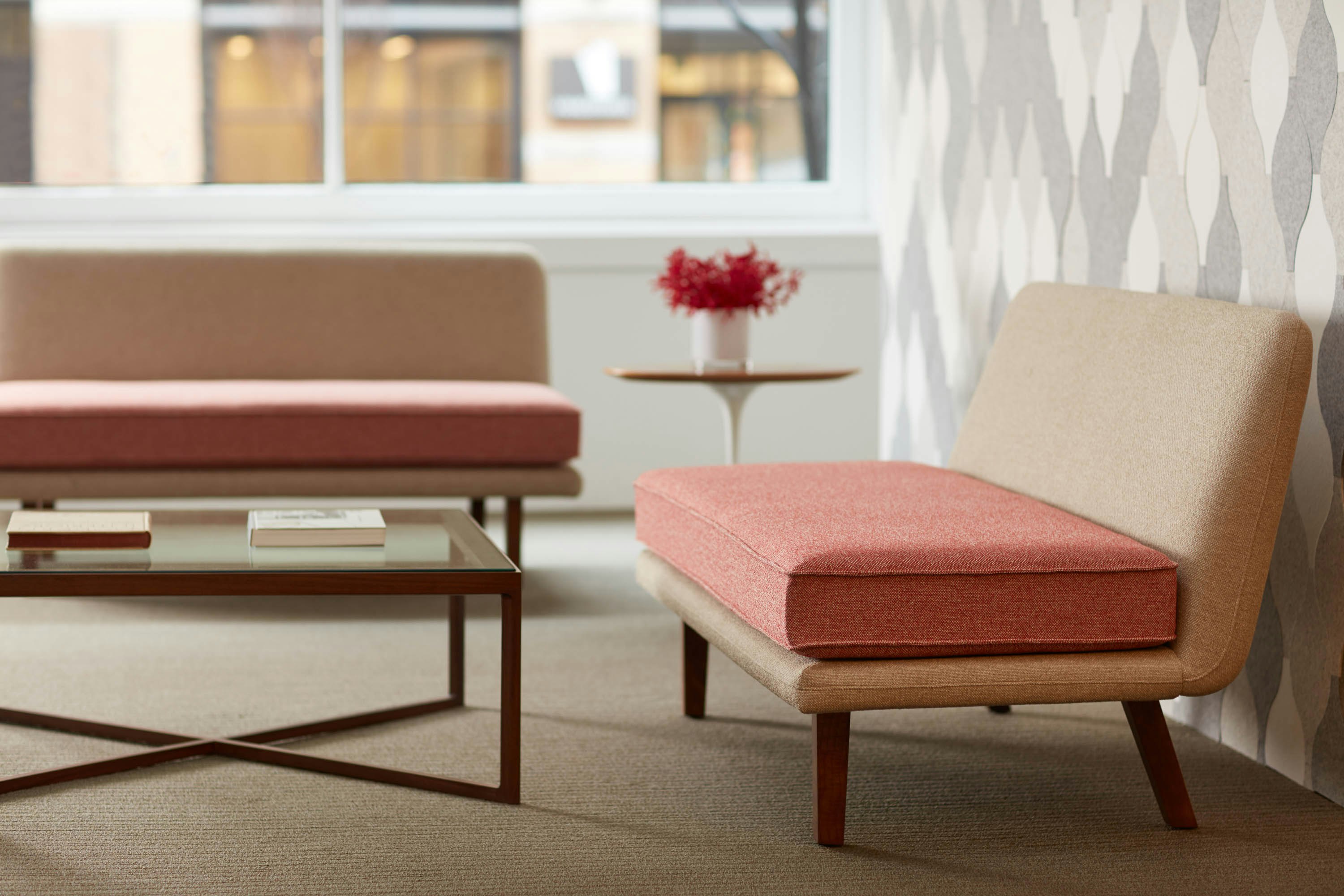 Rockwell Unscripted Settee Krusin coffee table saarinen side table