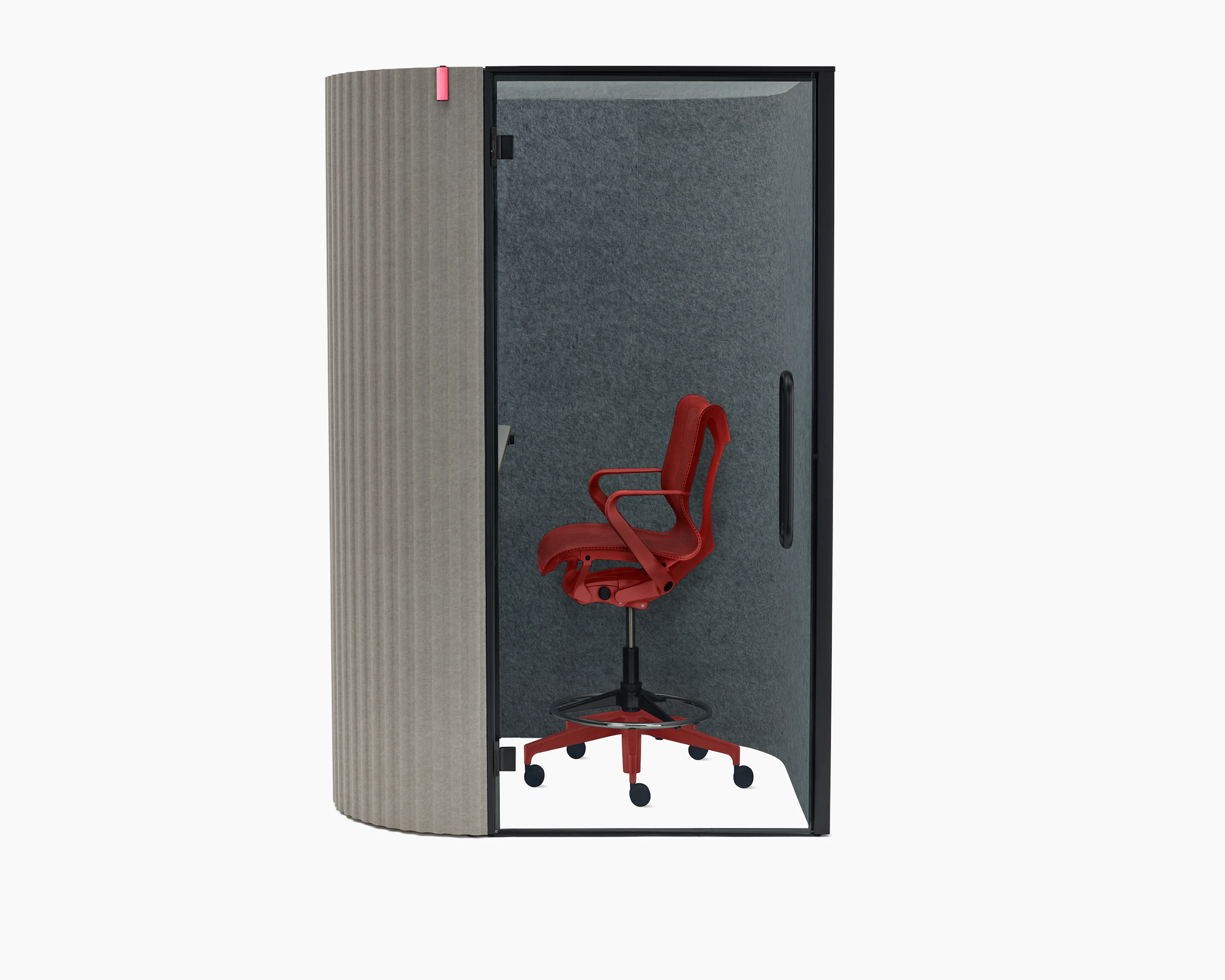 A front view of a Bay Work Pod with a Cosm Stool behind the clear glass door.