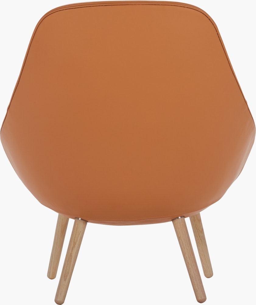 A sand About A Lounge 92 Armchair with high back viewed from the back
