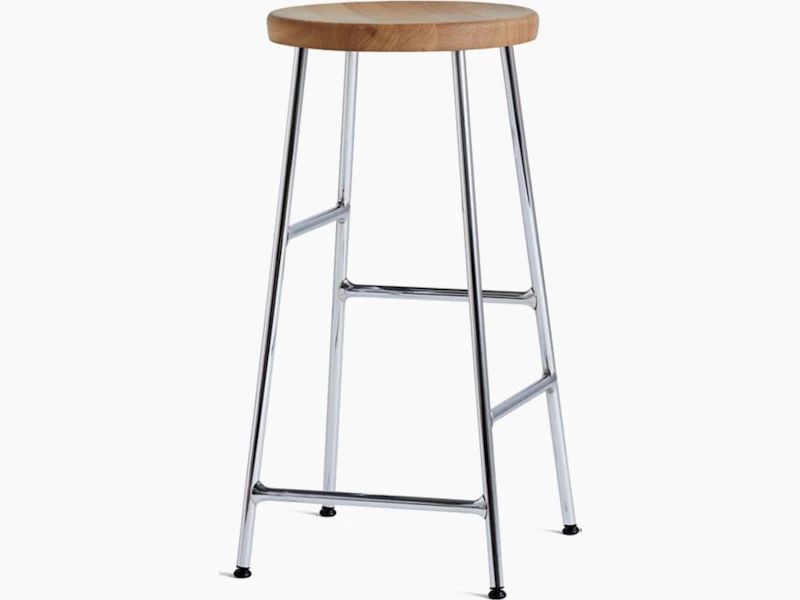 A Cornet Counter Stool with an oak seat and chrome base.