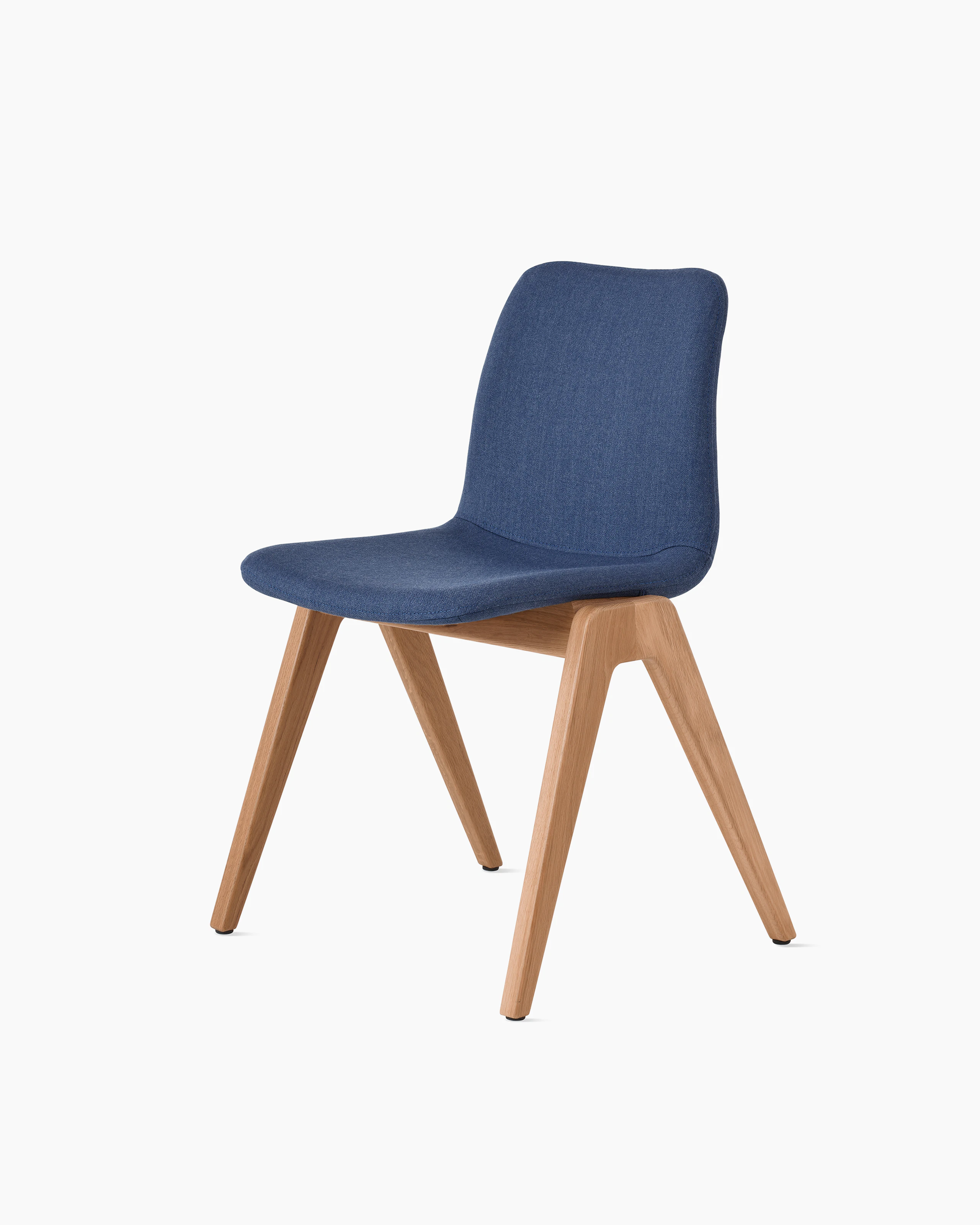White sweep of Viv wood chair with dark blue fabric and 4 leg solid oak wood base