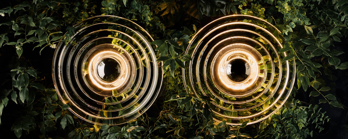Two Press Surface Large Clear LED lights on a leafy background