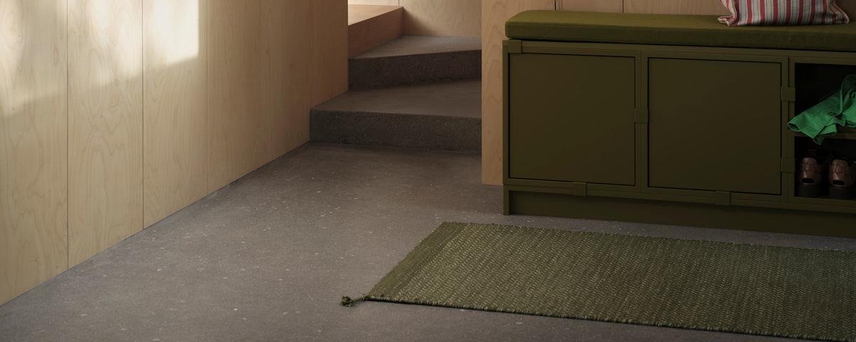 Recycled Ply Rug and Stacked Storage System in an entryway setting