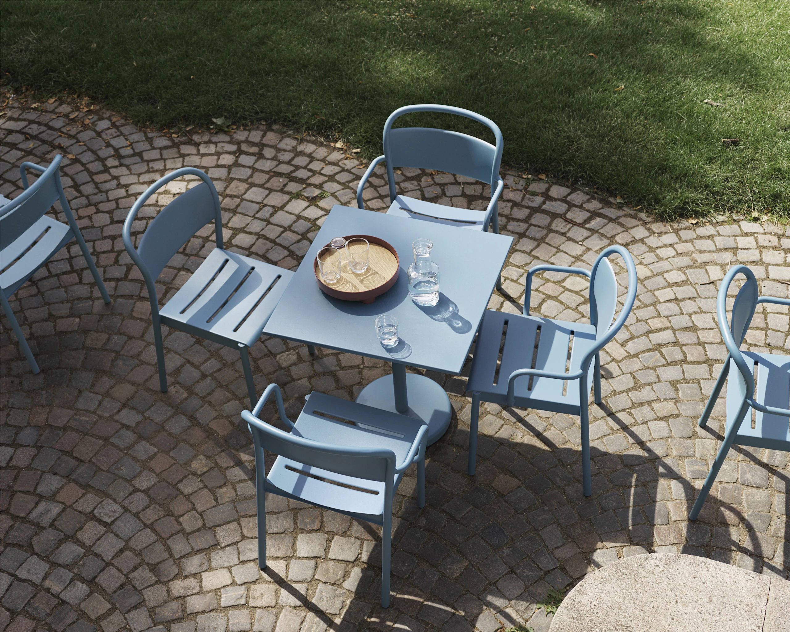 Linear Steel Café Table, Raise Carafe, Raise Glasses, Platform Tray