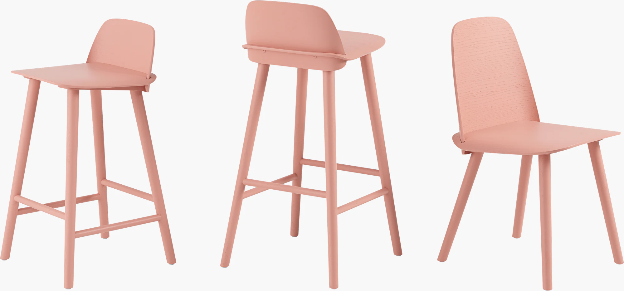 Set of Nerd Chair views in light pink upholstery and tapered legs.
